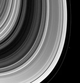 At the edge of Saturn : artificial intelligence in search of new moons